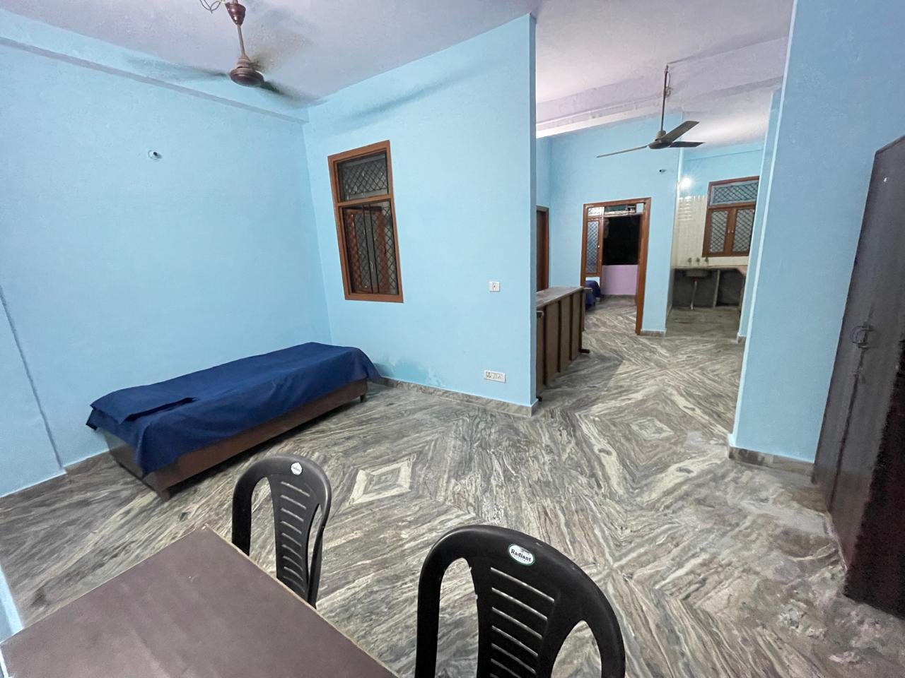 Spacious room interior at Sunrise Girls PG, Ashok Vihar Delhi