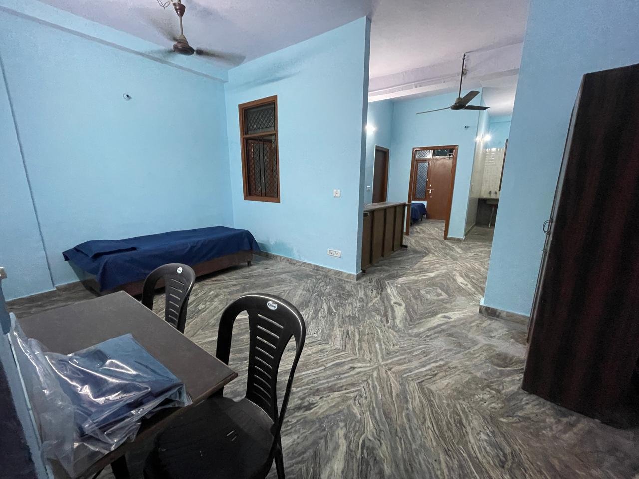 Well-furnished room at Sunrise Girls PG Hostel